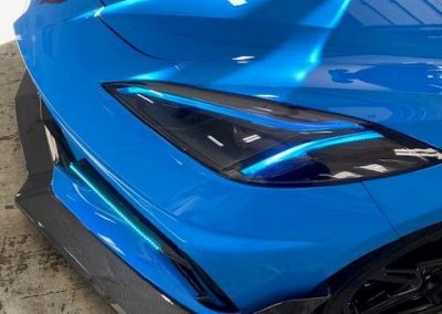 Blue sportscar with front bumper