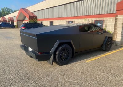 Windows tinting and wrap on Tesla truck