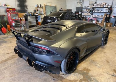 gray sportscar view from the back